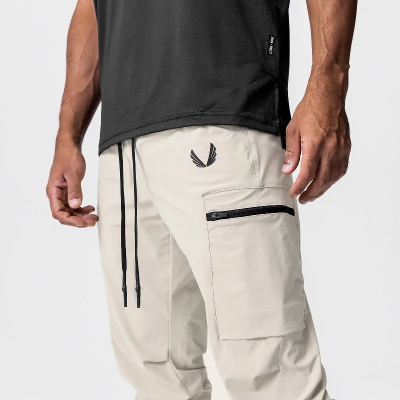 0827. Tetra-Lite™ Inlay Pocket High Rib Jogger - Sand Smoke