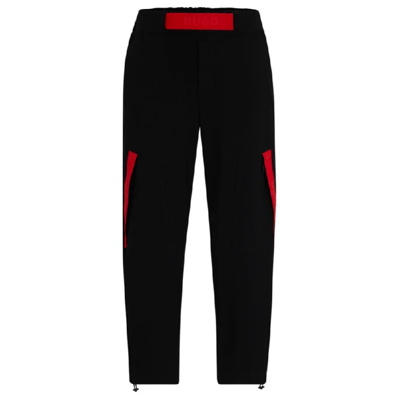 Relaxed-fit tracksuit bottoms with red logo tape