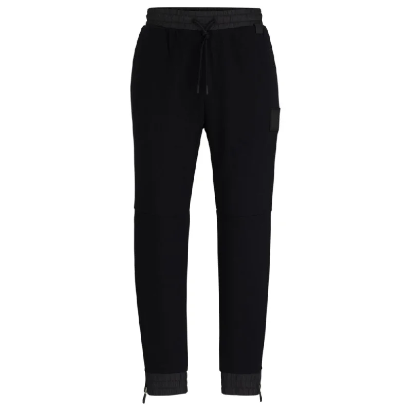 Stretch-cotton tracksuit bottoms with logo patch